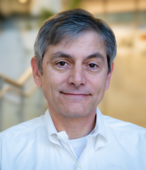 A professional headshot of Testso in the IMET Lobby 