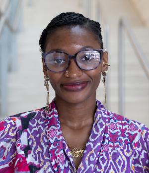 A professional headshot of Mariah in the IMET lobby