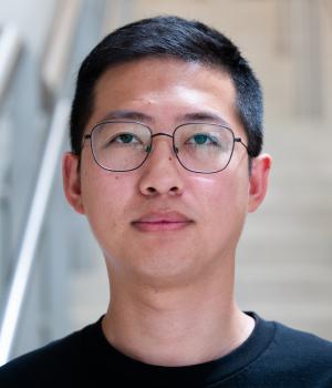 A professional headshot of Yuting Lin in the IMET lobby 