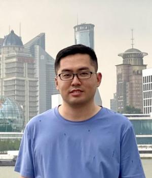 zhanxiong zhang with shanghai skyline in background
