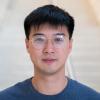 A professional headshot of Yu Ting in the IMET lobby