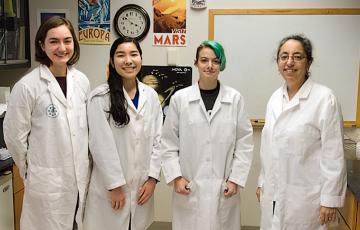 4 members of Dassarma lab pose for a photo