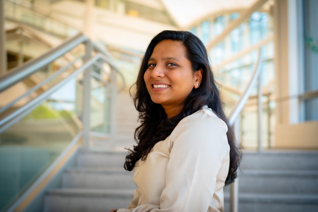 a professional headshot of Ronita on the IMET tent stairs 